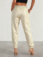 Pantalones jogger elegantes de cuero sintético para mujer
