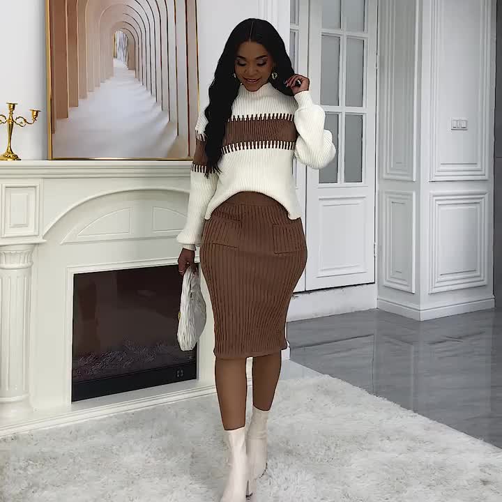 Completo da donna con maglione in maglia a coste e gonna midi