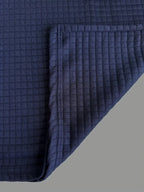 Polo à manches longues texturé pour homme avec fermeture à boutons quart de zip