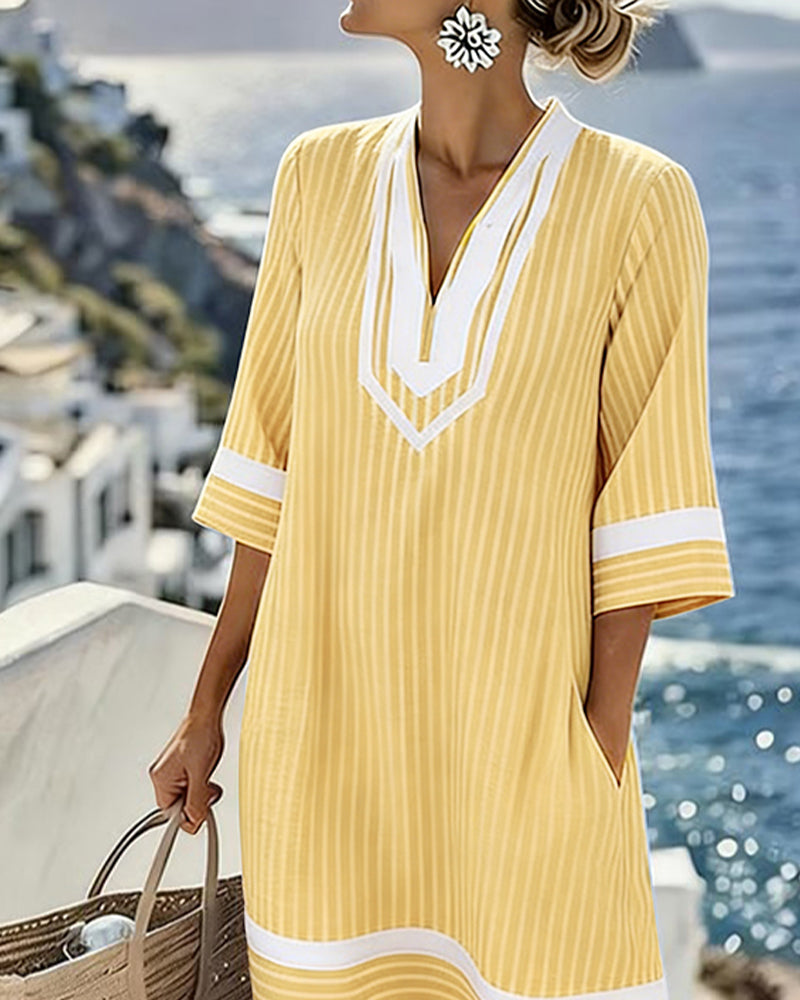 Vestito a tunica da donna a righe con scollo a V