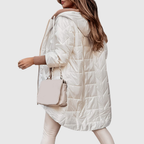 Damen-Steppjacke mit Kapuze, extra langem Schnitt und Daunenoptik