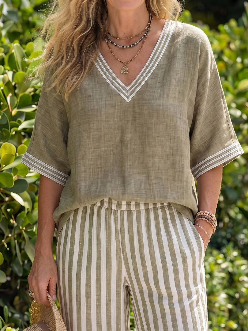 Completo da donna a due pezzi a righe con pantaloni a gamba larga