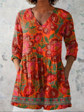 Damebluse med botanisk print og rynkedetaljer
