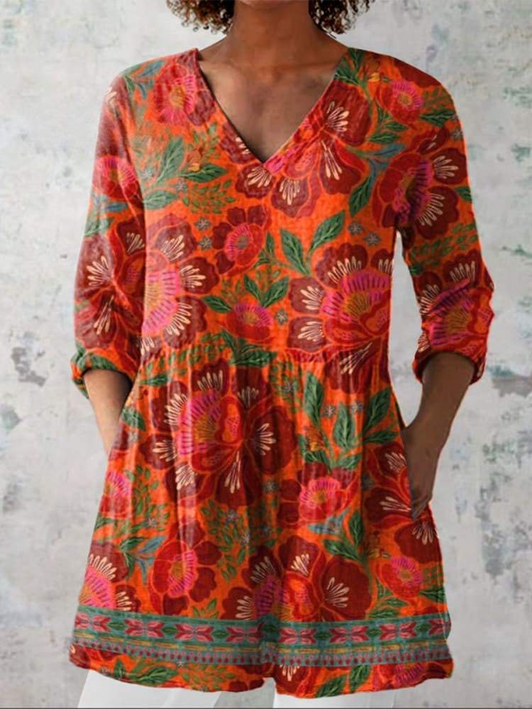 Damebluse med botanisk print og rynkedetaljer