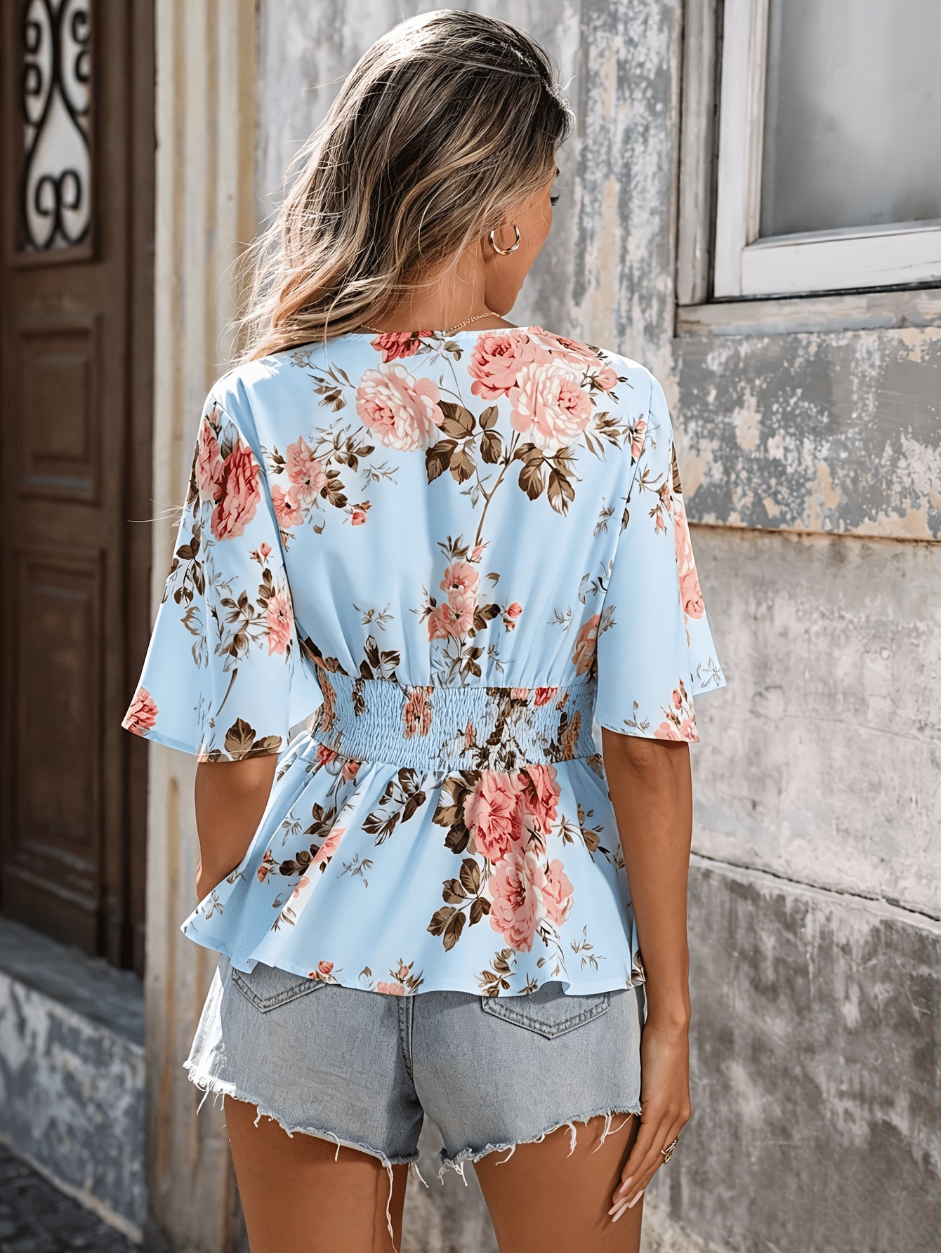 Women's Floral V-Neck Blouse with Shirred Waist and Flared Hem