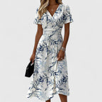 Damen Midikleid mit Wickeloptik, V-Ausschnitt, Blumenmuster und kurzen Ärmeln