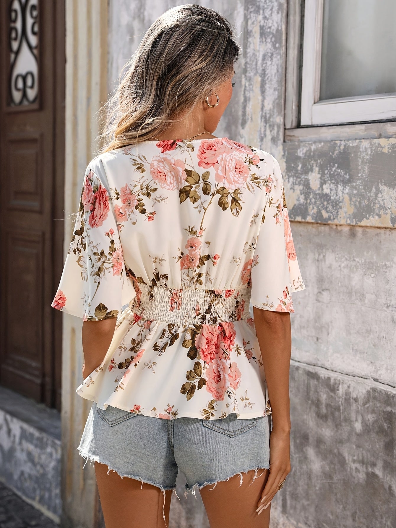 Women's Floral V-Neck Blouse with Shirred Waist and Flared Hem
