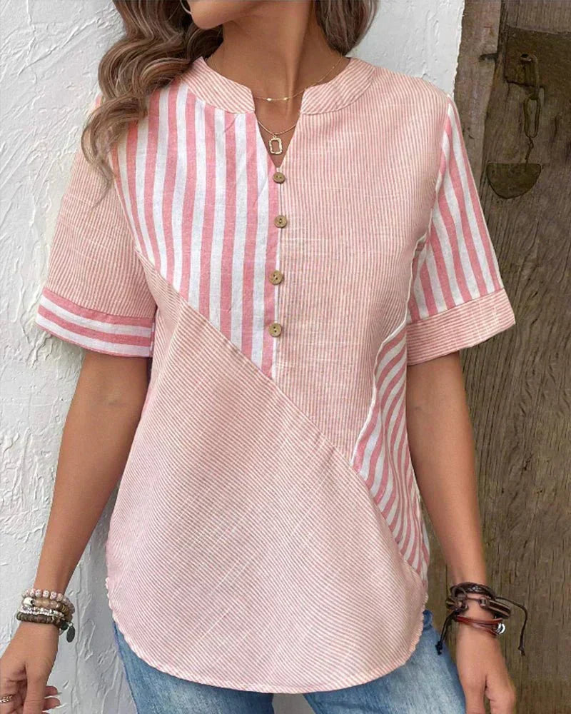 Damebluse med knapper og blandede striber