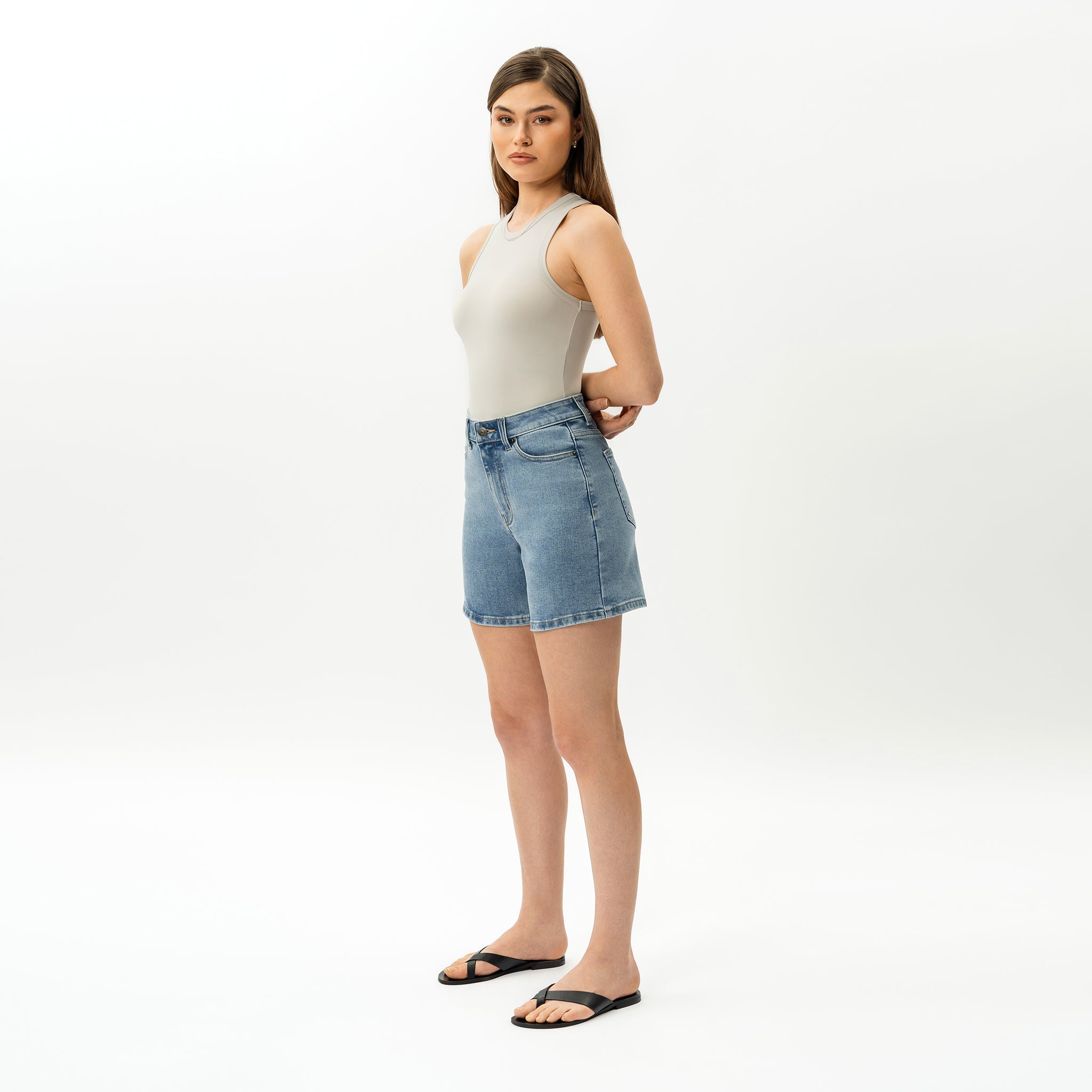 Pantalones cortos de mezclilla elástica para mujer