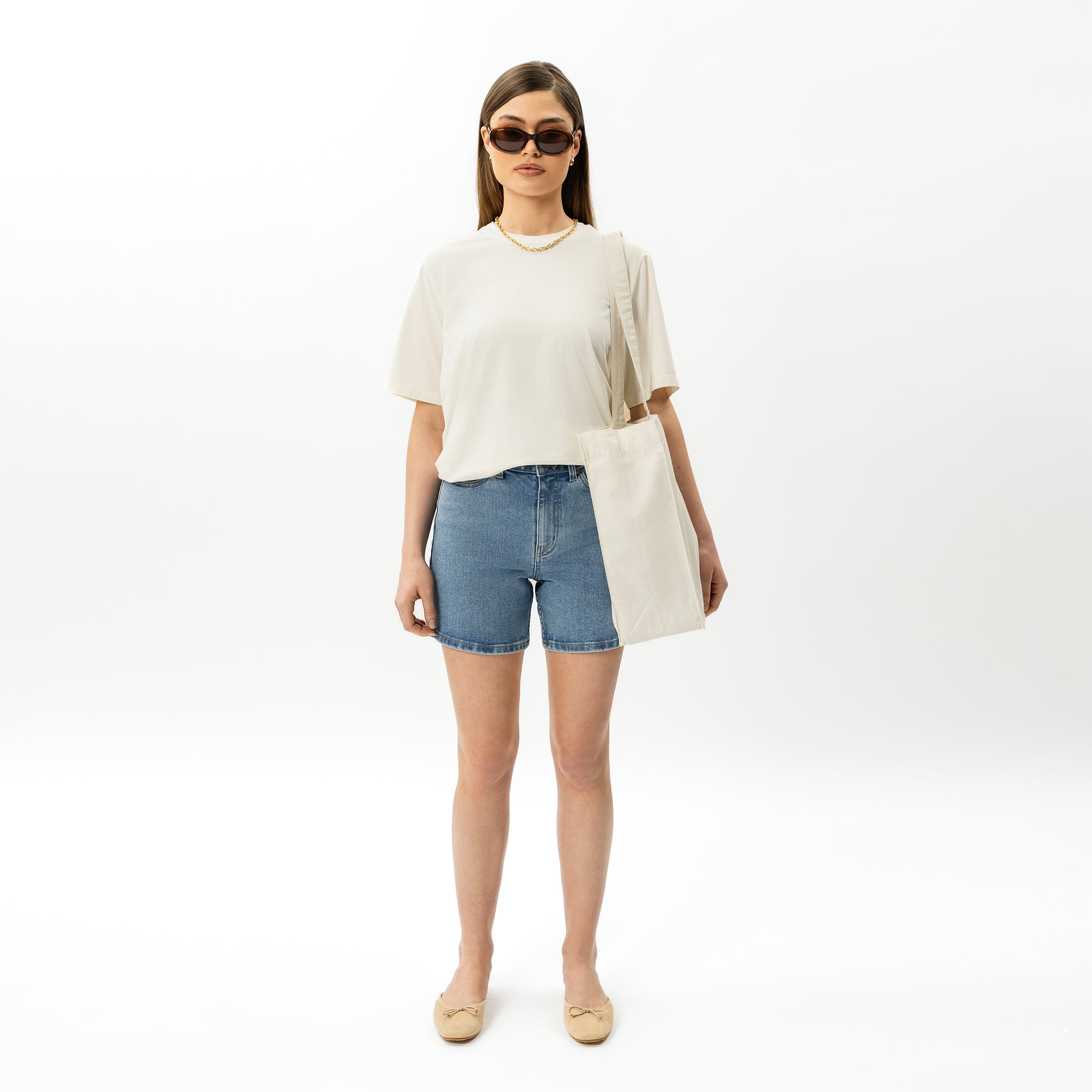 Pantalones cortos de mezclilla elástica para mujer
