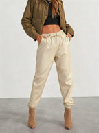 Pantalones jogger elegantes de cuero sintético para mujer