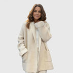 Cappotto lungo strutturato da donna aperto sul davanti