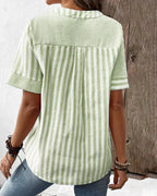 Damebluse med knapper og blandede striber