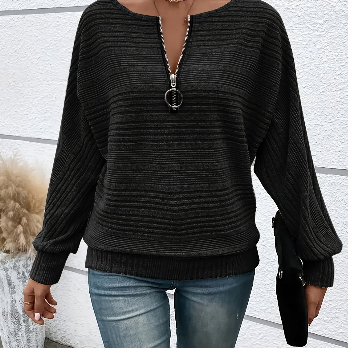 Pull-over côtelé pour femme à demi-zip