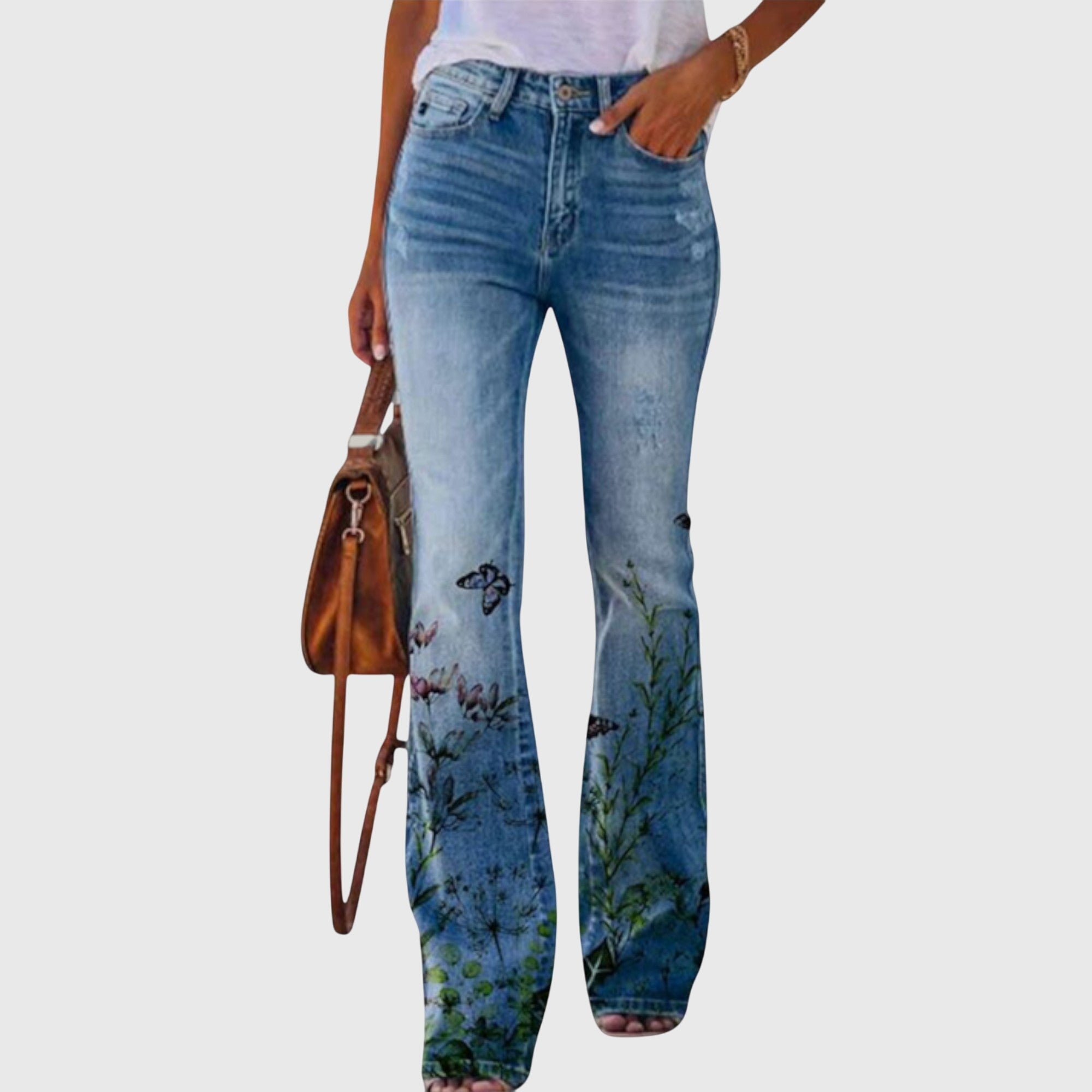 Damejeans med blomsterprint og vidde