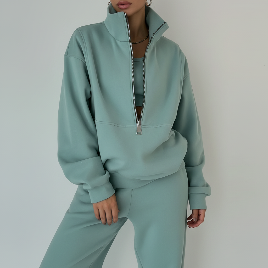 Sweat-shirt pour femme à col montant et fermeture zippée un quart