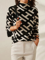 Maglione da donna in maglia geometrica con collo alto finto