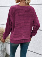 Ribstrikket pullover til kvinder med kvart lynlås