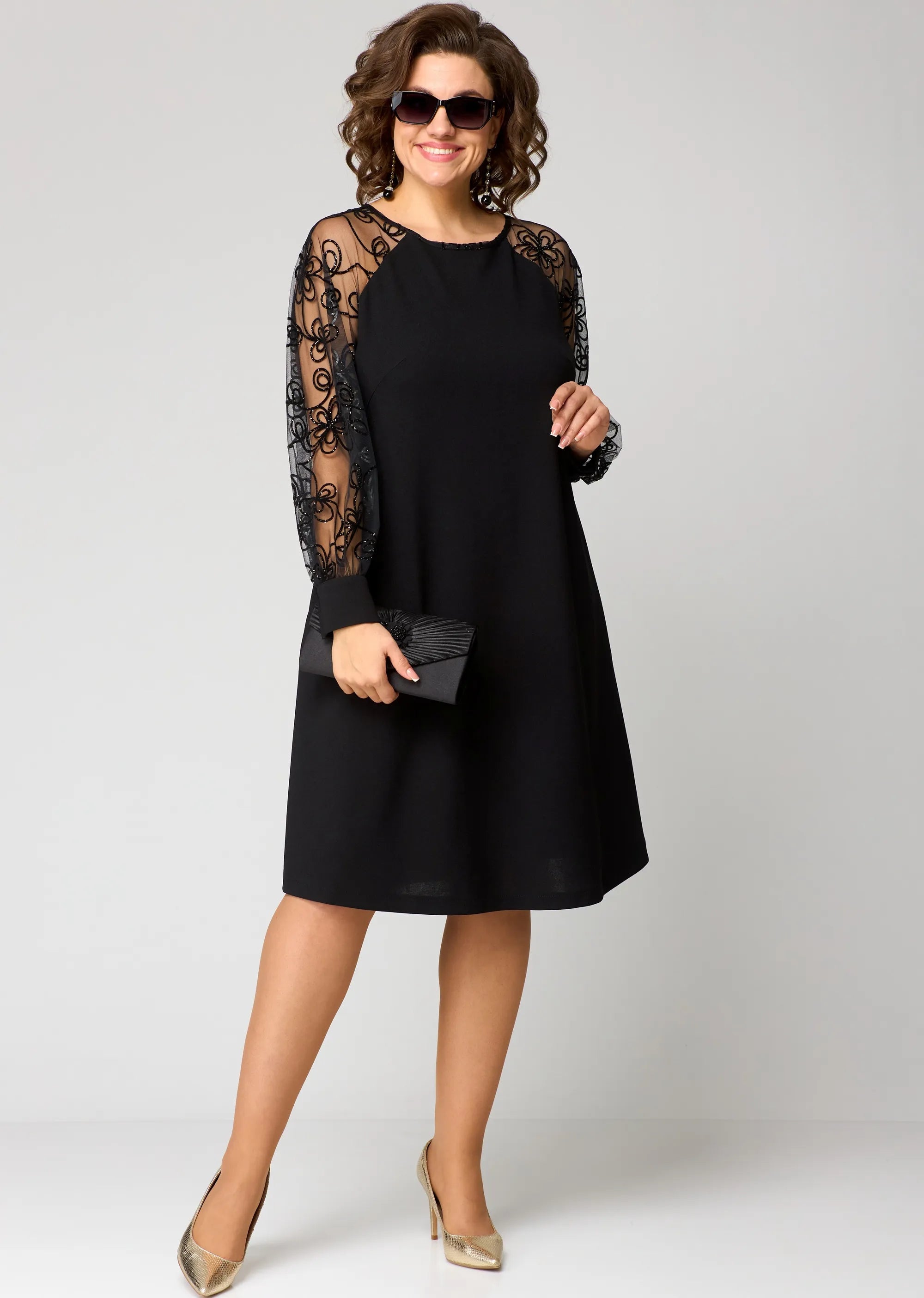 Abito elegante da donna a linea A con maniche in pizzo