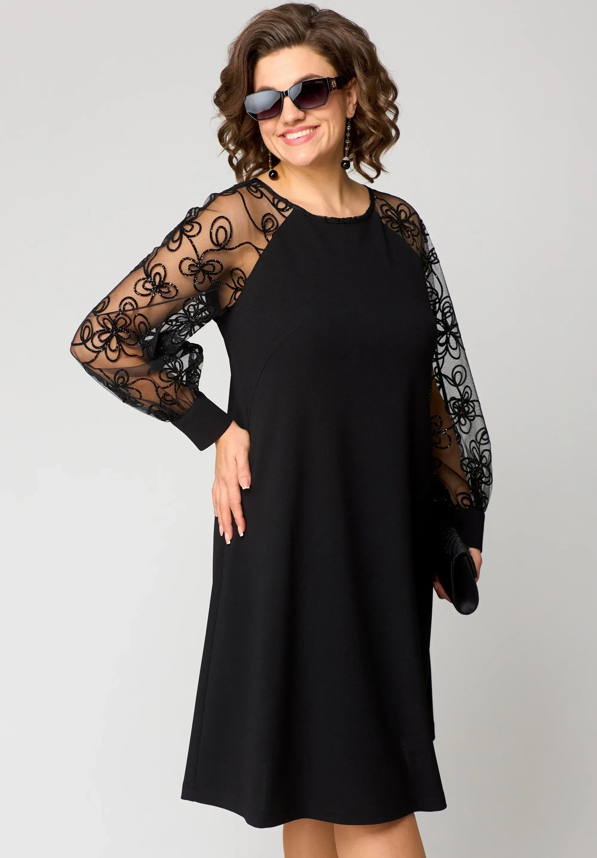 Abito elegante da donna a linea A con maniche in pizzo