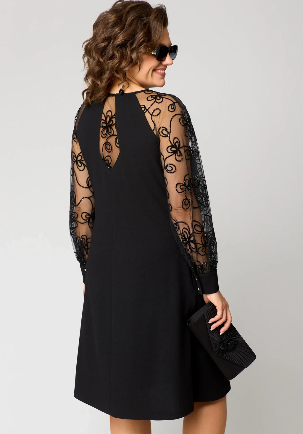 Abito elegante da donna a linea A con maniche in pizzo