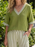 Completo da donna a due pezzi a righe con pantaloni a gamba larga