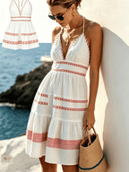 Women's Halterneck Knee-Length Dress with V-Neck and Tiered Skirt Design