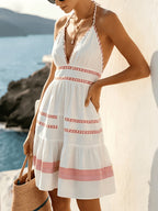 Women's Halterneck Knee-Length Dress with V-Neck and Tiered Skirt Design