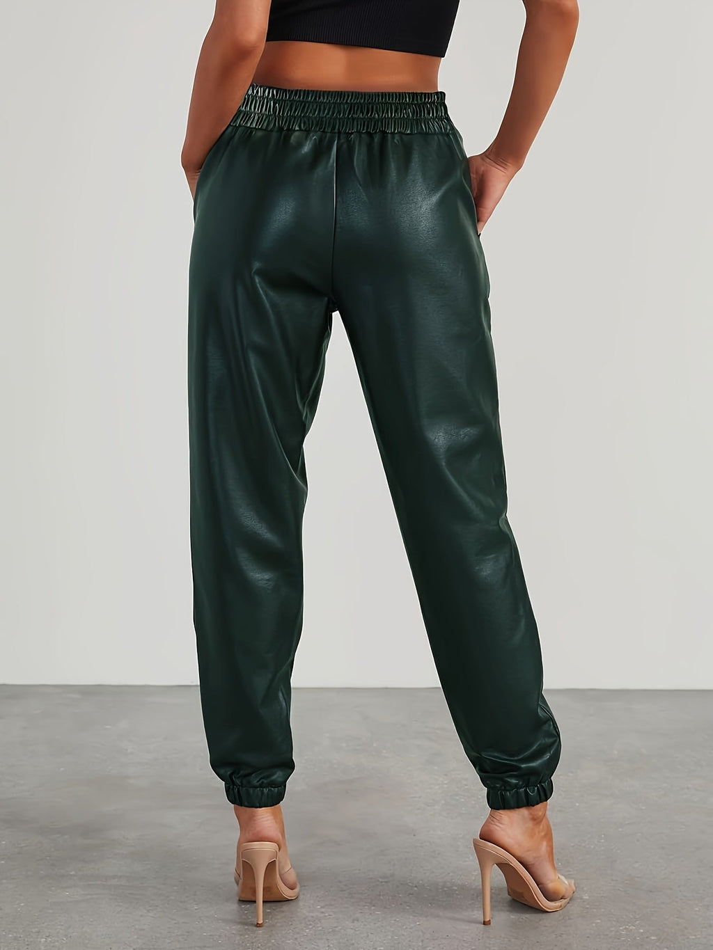 Pantalones jogger elegantes de cuero sintético para mujer