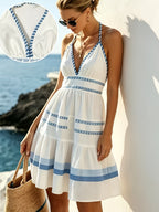 Women's Halterneck Knee-Length Dress with V-Neck and Tiered Skirt Design