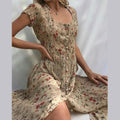 Damen Midikleid mit Blumenmuster, Vintage-Knopfdetail und fließendem Schnitt