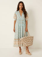 Women's Bohemian Printed Tassel Tie V-Neck Maxi Dress with Smocked Sleeves