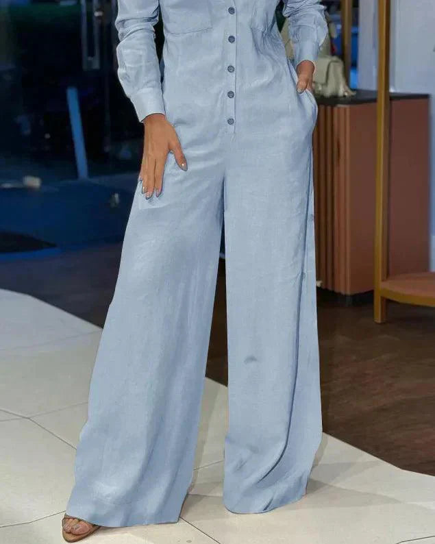 Damen Jumpsuit mit weitem Bein, langen Ärmeln und durchgehender Knopfleiste