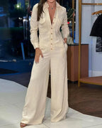 Damen Jumpsuit mit weitem Bein, langen Ärmeln und durchgehender Knopfleiste