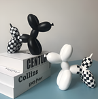 Scultura decorativa a forma di cane con palloncini