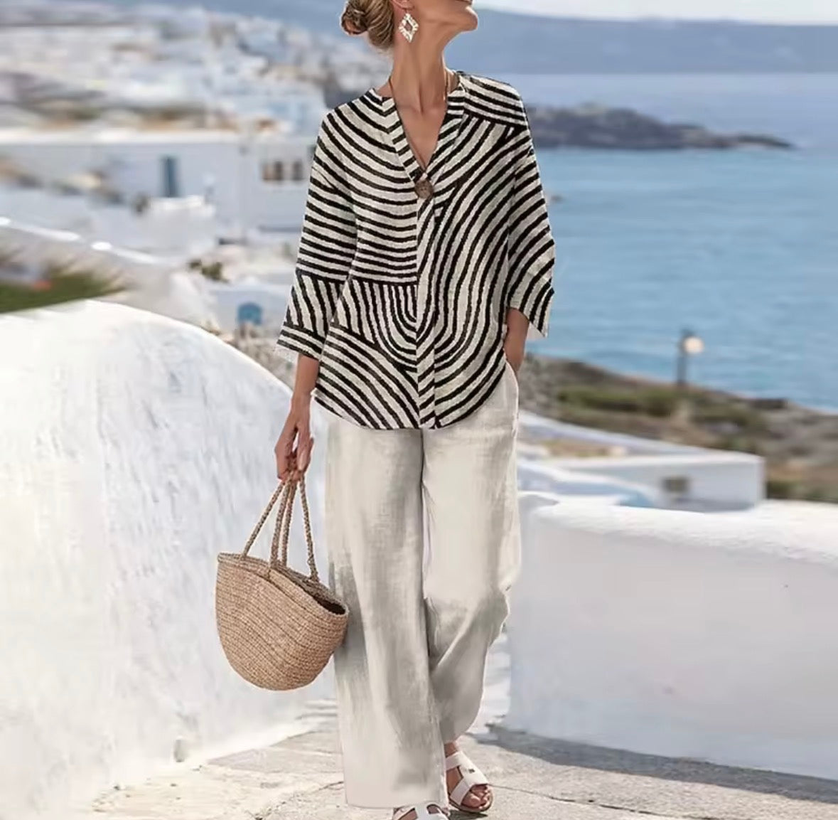 Blouse pour femme à rayures directionnelles et col en V