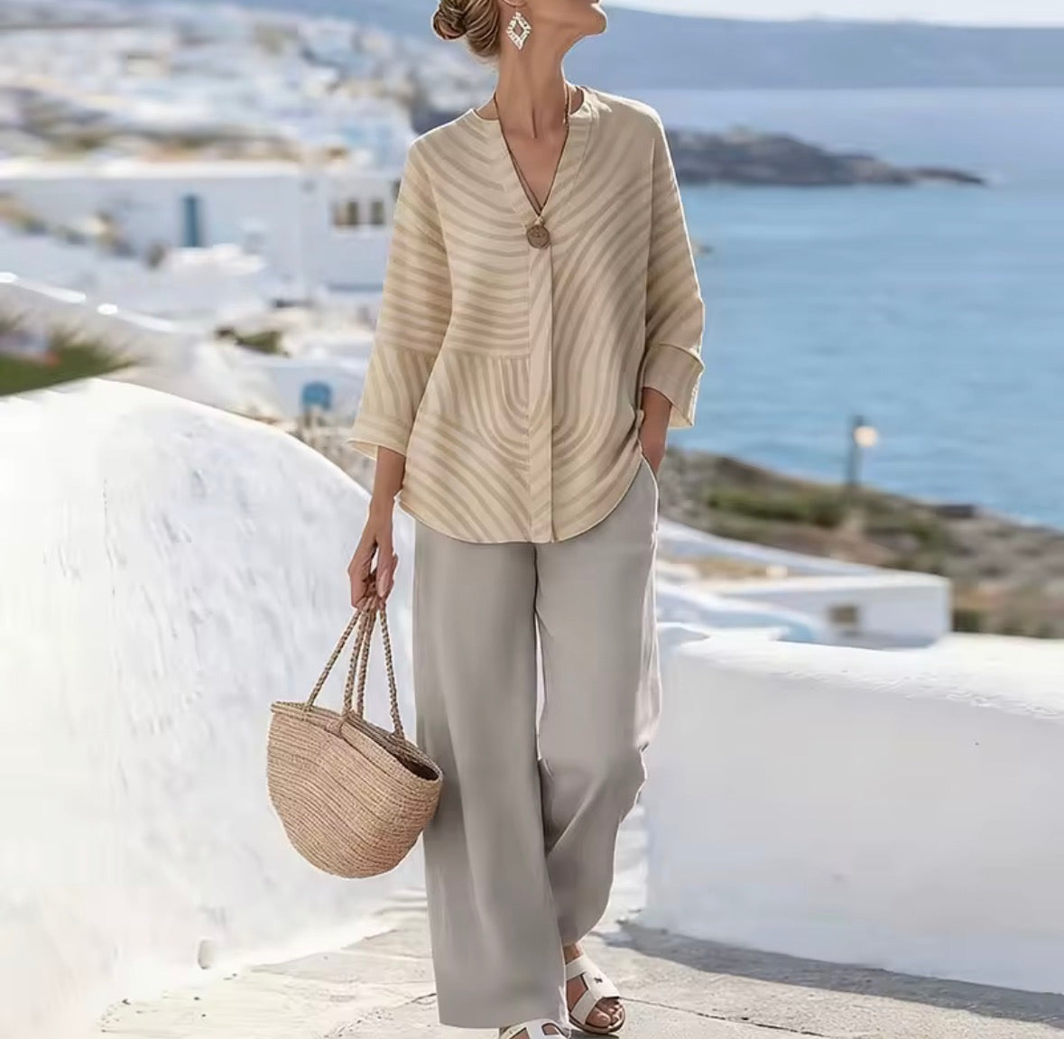Blouse pour femme à rayures directionnelles et col en V