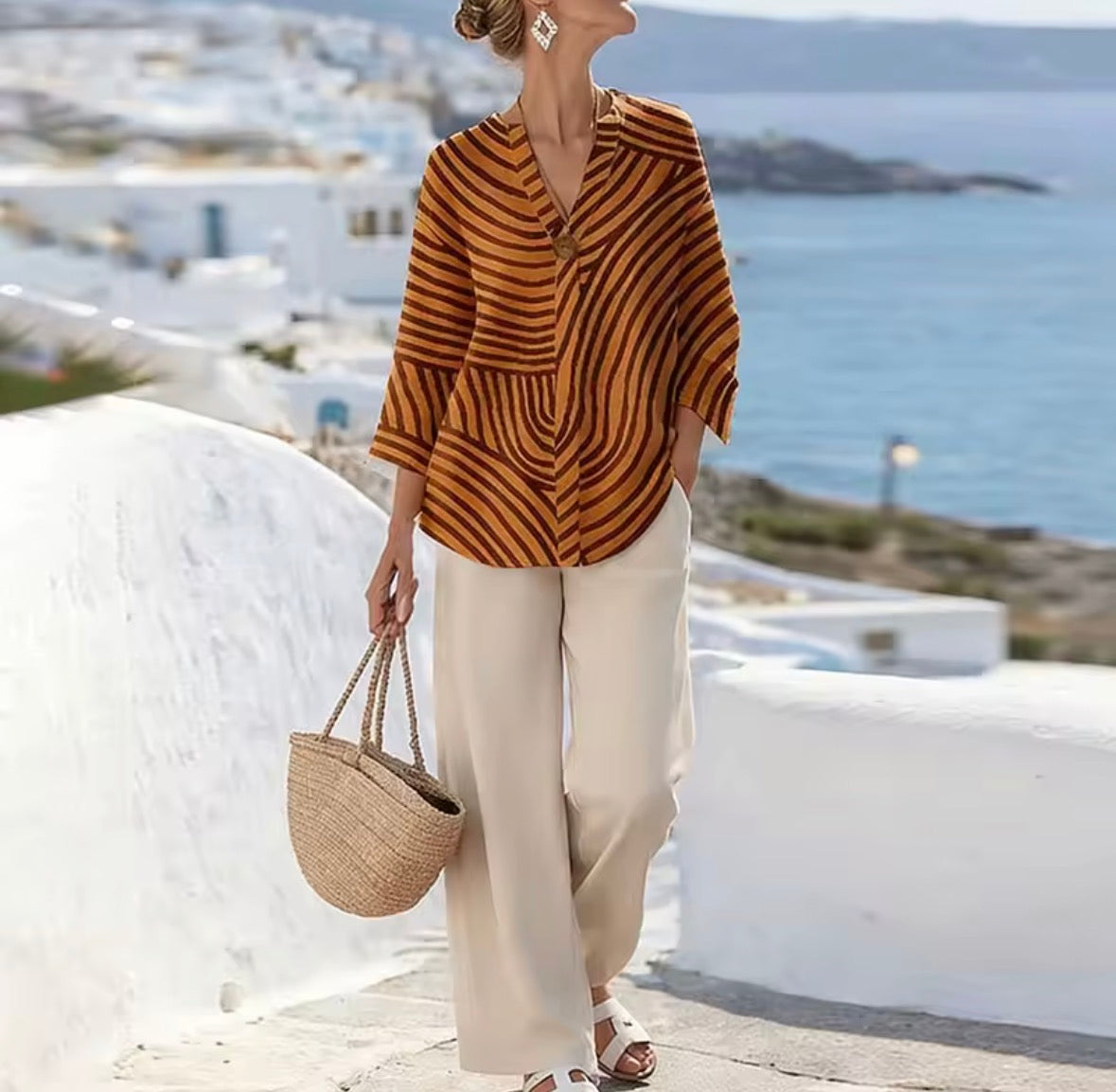 Blouse pour femme à rayures directionnelles et col en V