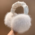 Winter-Ohrenschützer aus Kunstfell mit gestricktem Stirnband
