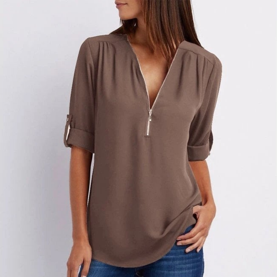 Blouse femme à col en V et fermeture éclair sur le devant