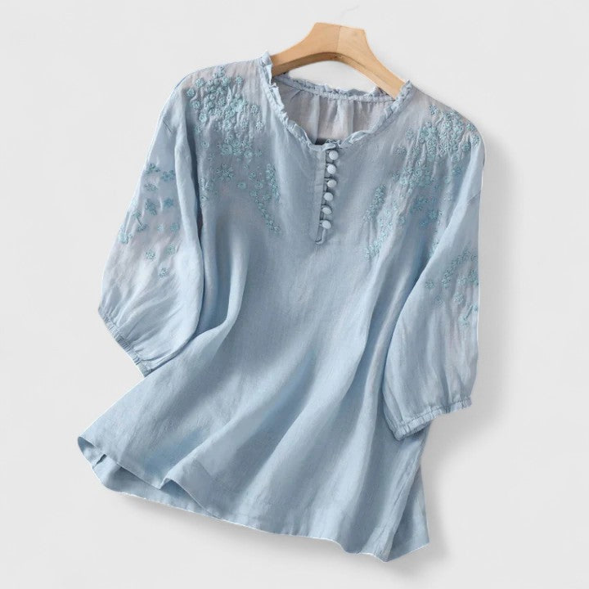 Blouse pour femme brodée à col volanté