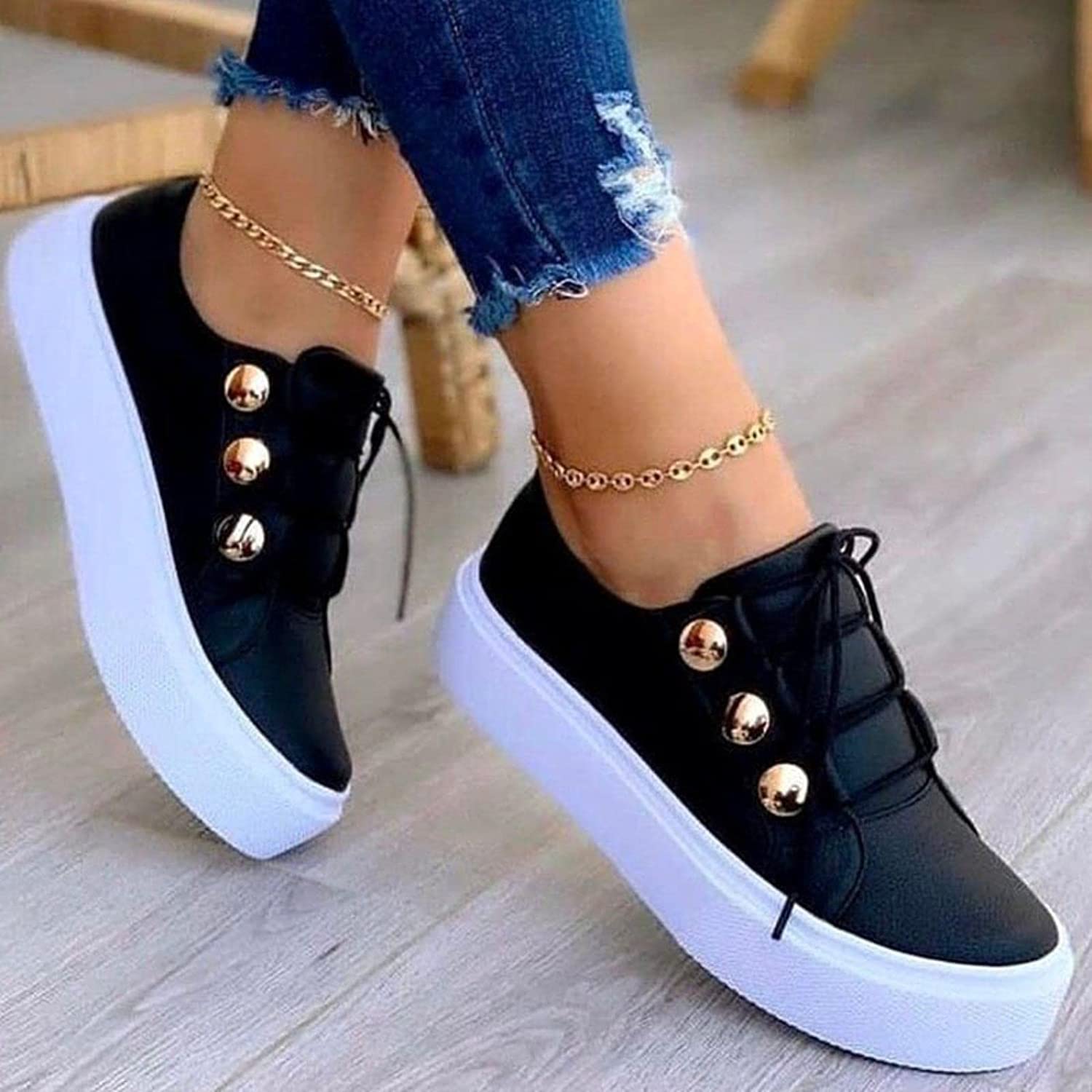 Damers platå sneakers med snörning och metallknappdetaljer