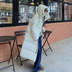 Manteau long matelassé à capuche pour femme