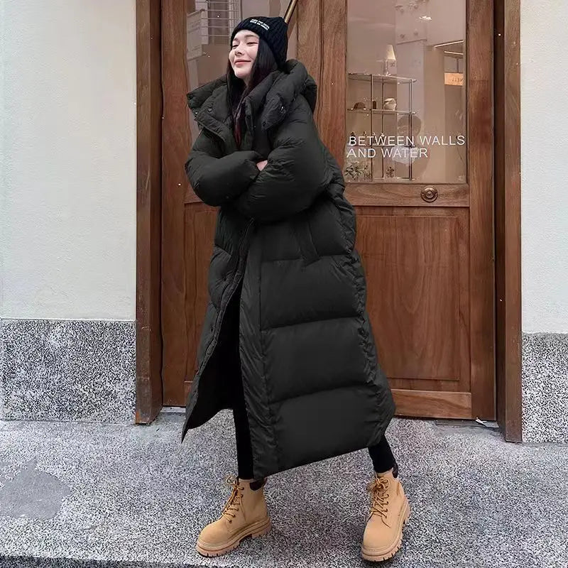 Manteau long matelassé à capuche pour femme
