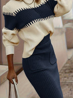 Completo da donna con maglione in maglia a coste e gonna midi