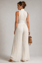 Damen Jumpsuit mit weitem Bein, Blumenmuster, Plisseefalten, Neckholder, Reißverschluss vorne und tailliertem Bund