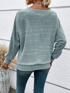 Ribstrikket pullover til kvinder med kvart lynlås