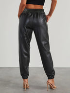 Pantalones jogger elegantes de cuero sintético para mujer