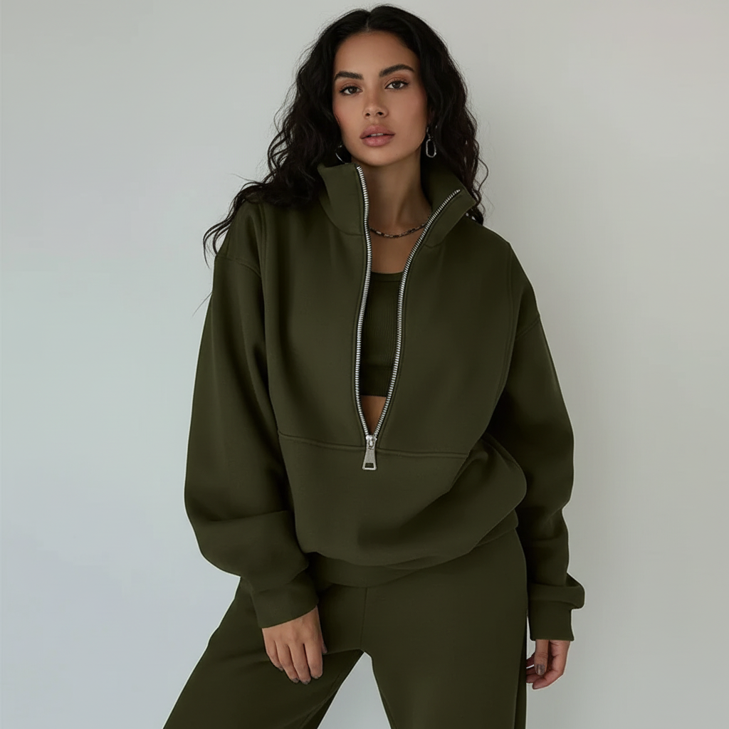 Sweat-shirt pour femme à col montant et fermeture zippée un quart
