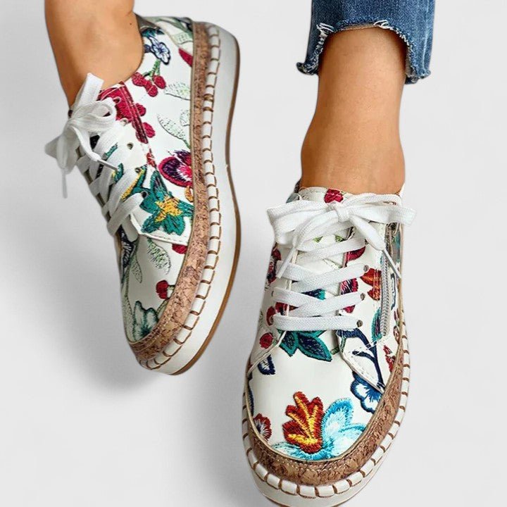 Damesneakers med blomsterprint og plateau i lærred